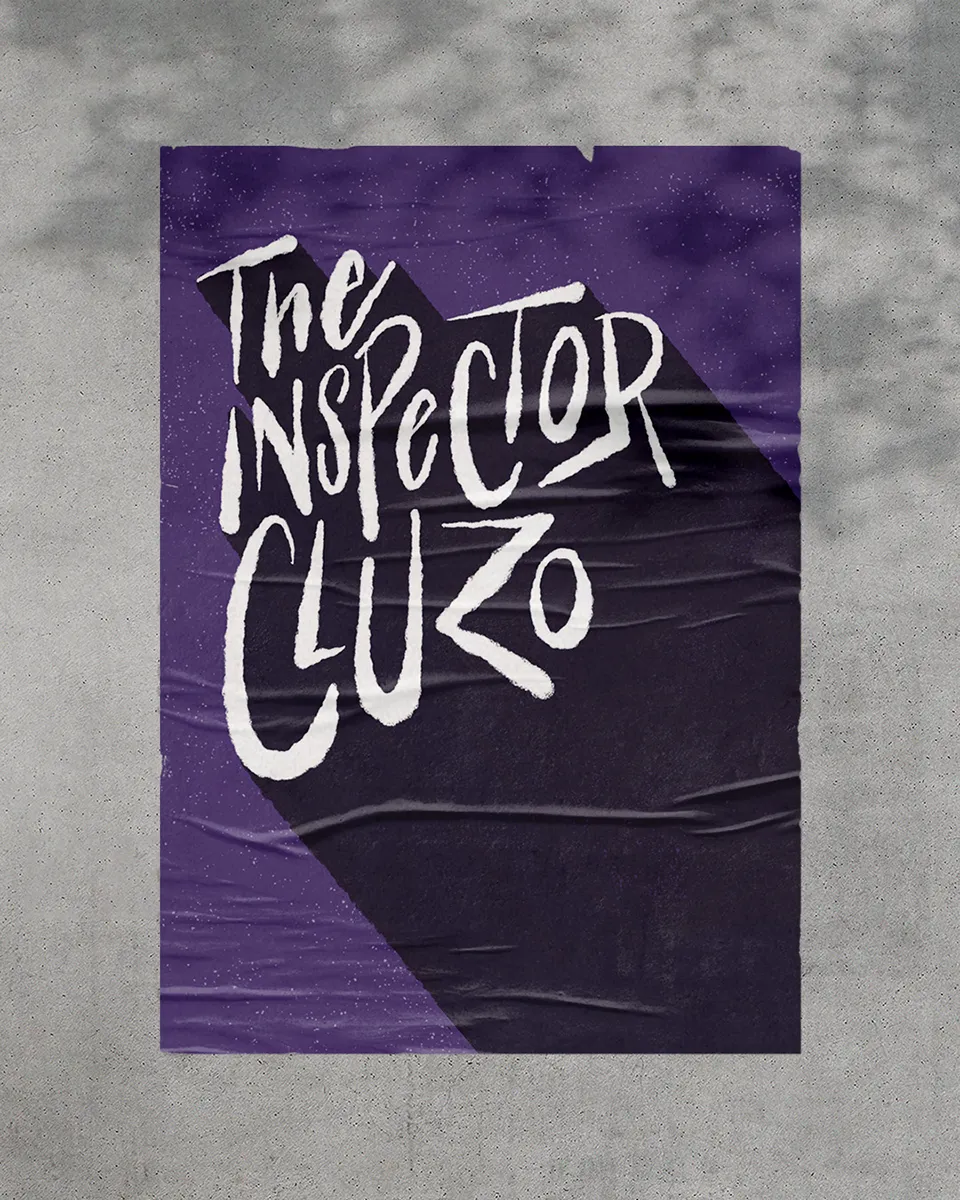 Affiche portant le lettrage rendant hommage à The Inspector Cluzo, collée sur un mur en béton.